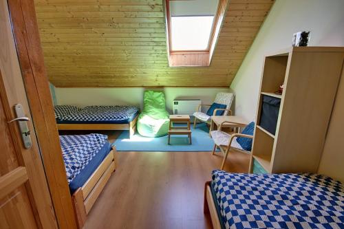 Postel nebo postele na pokoji v ubytování Holiday Home Kvitek
