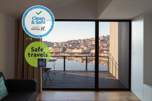 a sign for a sale of a house with a balcony at Oh! Porto Apartments in Vila Nova de Gaia