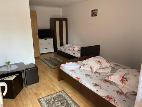 Postel nebo postele na pokoji v ubytování Casa Gabriela