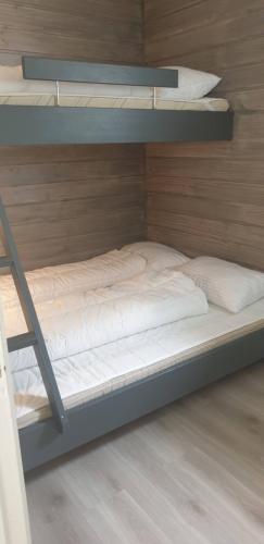 Ένα ή περισσότερα κρεβάτια σε δωμάτιο στο Oppdal Alpintun, Stølen øvre - ski in ski out