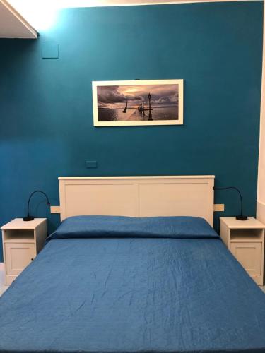Letto o letti in una camera di Alba Chiara B&B