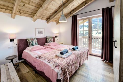 Postel nebo postele na pokoji v ubytování Königshaus by Alpin Bookings