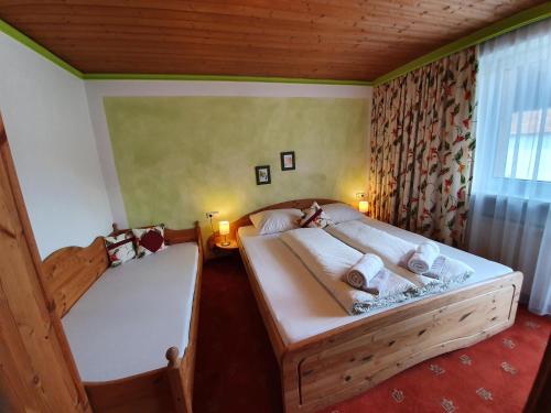 A bed or beds in a room at Apartment Rauch