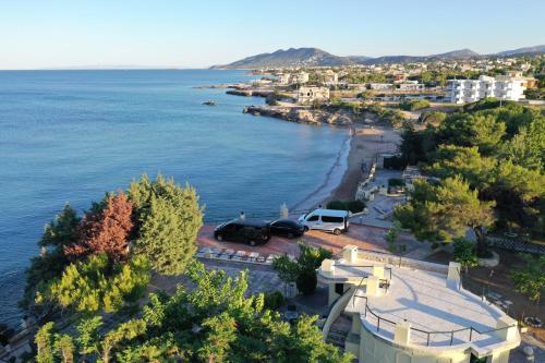 an aerial view of a beach and the ocean at Silis House on the beach in Artemida