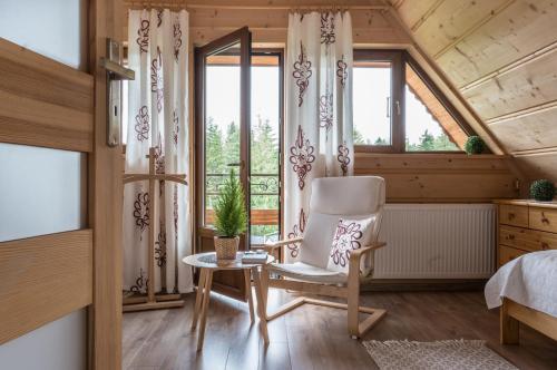 Posteľ alebo postele v izbe v ubytovaní Domek Odlotowy Zakatek