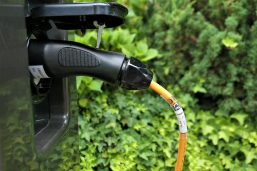 a hose is hooked up to a water faucet at Hotel Santoli in Porretta Terme