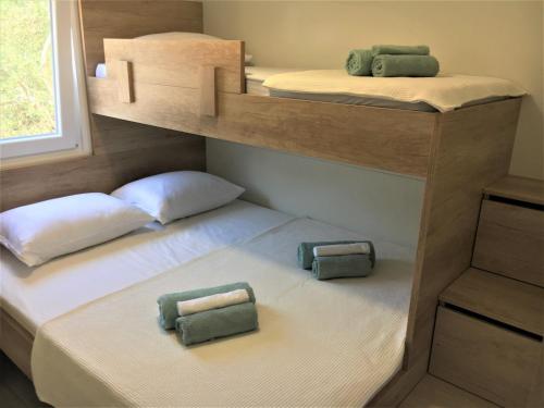 Postel nebo postele na pokoji v ubytování Mobile house Green garden