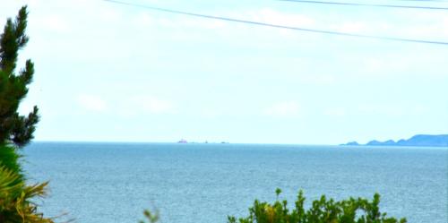 a view of a large body of water at Maison à 30m de la plage avec grand jardin in Plérin