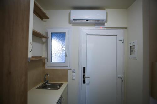 Kylpyhuone majoituspaikassa Verano Apartments