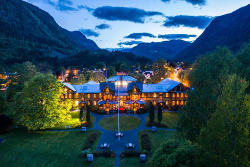 an aerial view of a resort with mountains at Dalen Hotel in Dalen