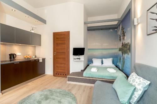 Ένα ή περισσότερα κρεβάτια σε δωμάτιο στο Old Town Apartment Długa 60