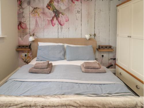 Postel nebo postele na pokoji v ubytování Barn Owl