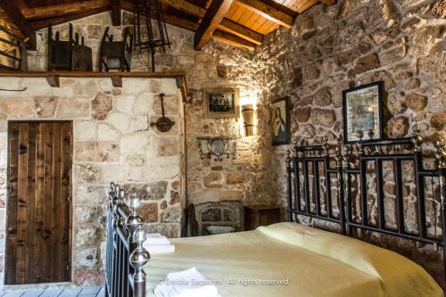 Postel nebo postele na pokoji v ubytování B&B Pergulea