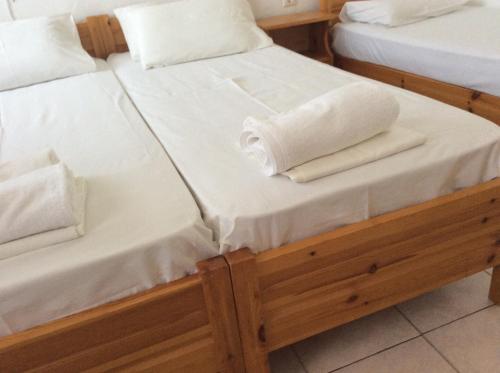 A bed or beds in a room at Despoina Rooms