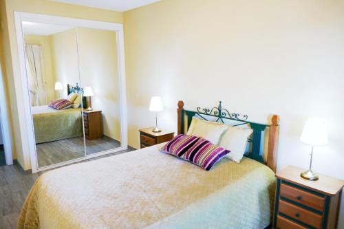 Llit o llits en una habitació de Baleal poolfront apartment