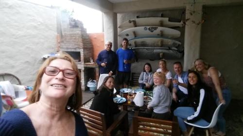 a group of people posing for a picture in a room at Easkey Hostel in Sligo
