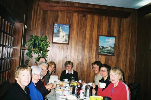 a group of people sitting at a table eating at Pens&atilde;o Repouso do Peregrino in Paredes de Coura
