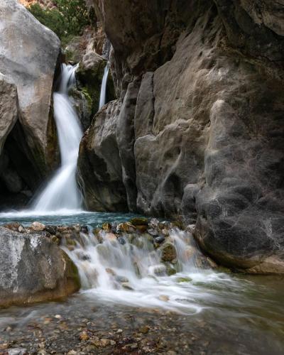a stream of water flowing through a rocky canyon at Kleanthi's House in Chania Town