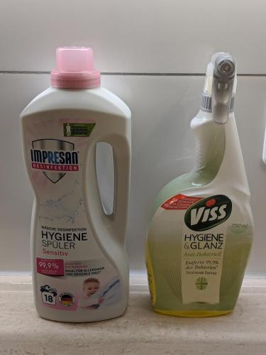 a bottle of milk next to a bottle ofadobeadobeadobeadobeadobeadobeadobe at FeWo Parkblick HH Schanze in Hamburg