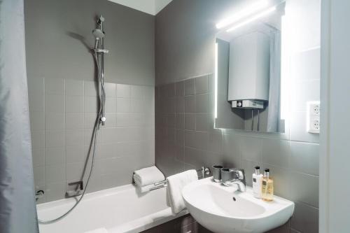 Ett badrum på Stylisches Münster City-Apartment 56 m²
