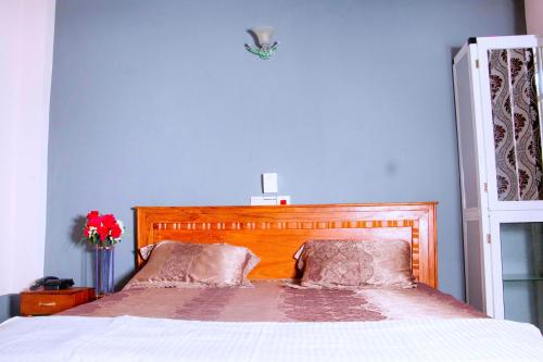 Кровать или кровати в номере Nora Hotel