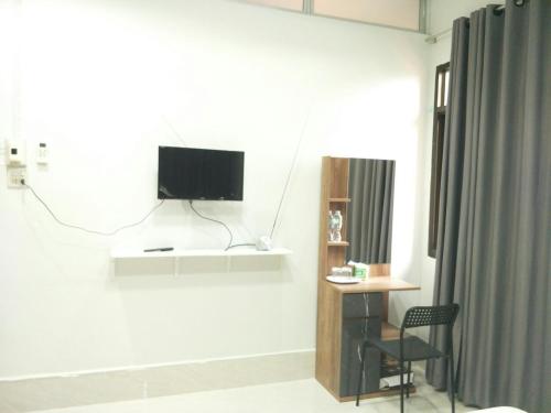 TV a/nebo společenská místnost v ubytování Betong Cozy Guesthouse เบตง โคซี่ เกสต์เฮาส์