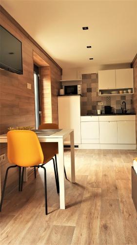 Η κουζίνα ή μικρή κουζίνα στο Erdőalja 11 Apartman