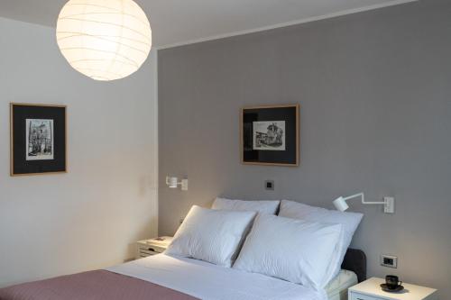 Una cama o camas en una habitación de Moderno 3 Casa Vecchia