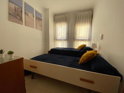 Кровать или кровати в номере SWEET HOME AYAMONTE
