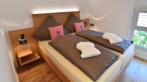 Una cama o camas en una habitación de DER OCHSEN