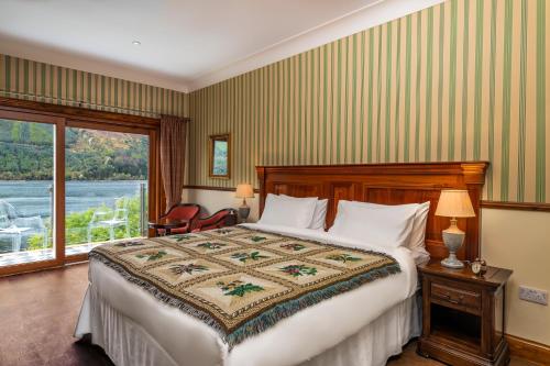 Katil atau katil-katil dalam bilik di The Whispering Pine Lodge