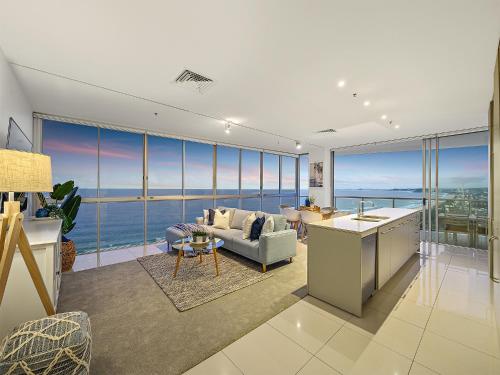 a living room with a view of the ocean at Air On Broadbeach in Gold Coast
