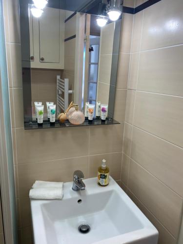 Et badeværelse på Apartment Genius Superior Ste Maxime 307