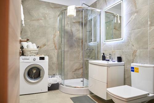 Ένα μπάνιο στο Meraki Luxury Apartment Spa n Pool Beach resort