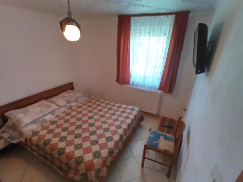 Postel nebo postele na pokoji v ubytování Apartment Mara