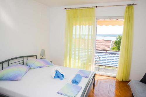 Ένα ή περισσότερα κρεβάτια σε δωμάτιο στο Apartment Andrić