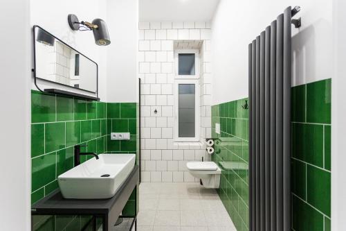 Kúpeľňa v ubytovaní Apartamenty Teatralna