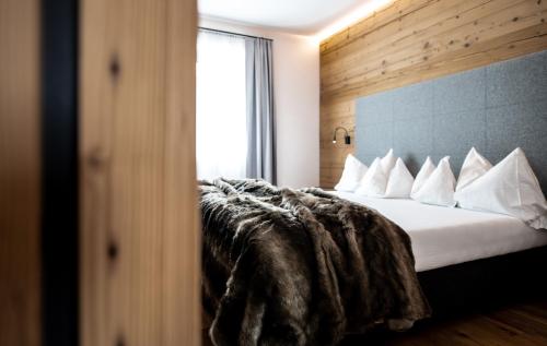 Posteľ alebo postele v izbe v ubytovaní Casteller Apartment Deluxe