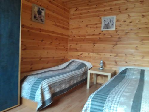 Postel nebo postele na pokoji v ubytování Przy morzu