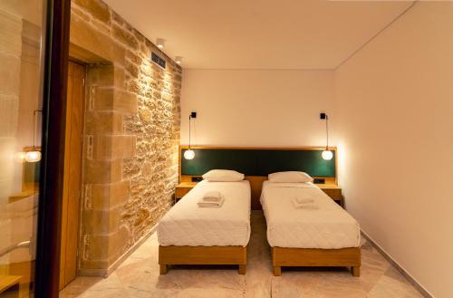 Ένα ή περισσότερα κρεβάτια σε δωμάτιο στο Anma Villa