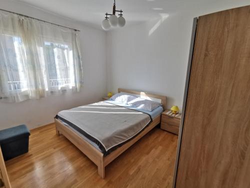 Postel nebo postele na pokoji v ubytování Apartment Slavica