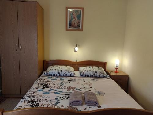 Postel nebo postele na pokoji v ubytování Apartment Mara