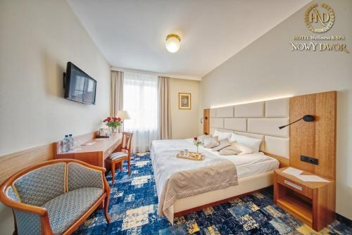 Krevet ili kreveti u jedinici u okviru objekta Hotel Wellness & Spa Nowy Dwór