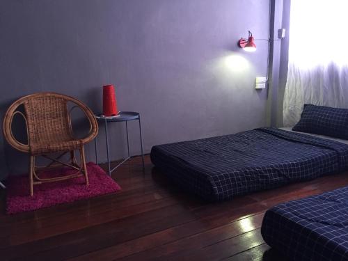 Llit o llits en una habitació de Hong hostel