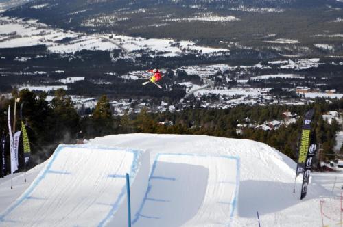 a person jumping off of a snow ramp at Trolltun Hotel & Hytter in Dombås