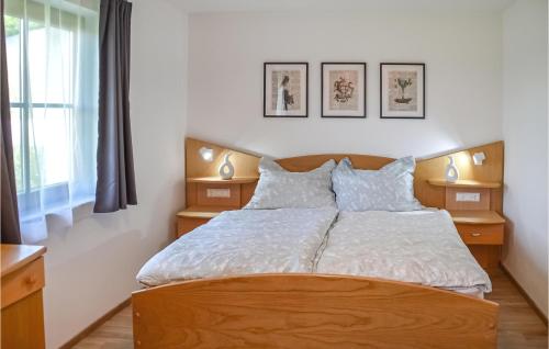 Posteľ alebo postele v izbe v ubytovaní Gorgeous Apartment In Techelsberg With House A Mountain View