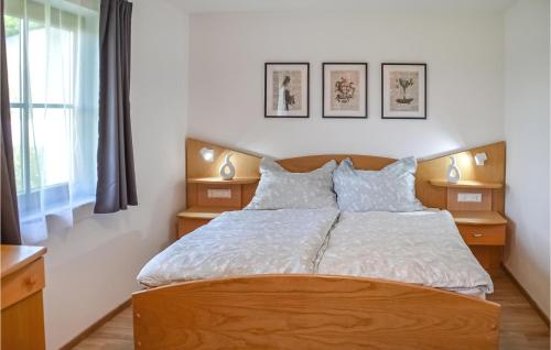 Postel nebo postele na pokoji v ubytování Ferienwohnung In Techelsberg