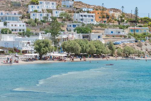 a view of a beach with people in the water at Anemologio in Finikas