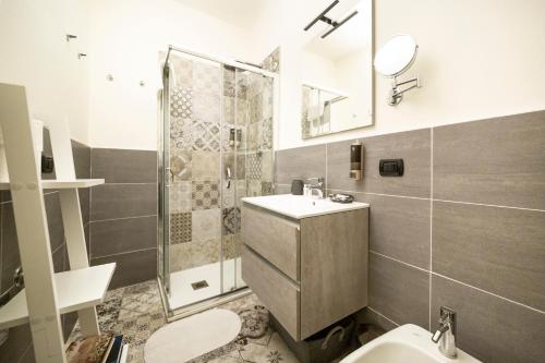 Vonios kambarys apgyvendinimo įstaigoje Affori Cosy Apartment