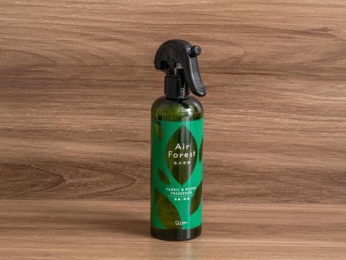 an air forest spray bottle on a wooden table at Far East Village Hotel Tokyo Ariake in Tokyo